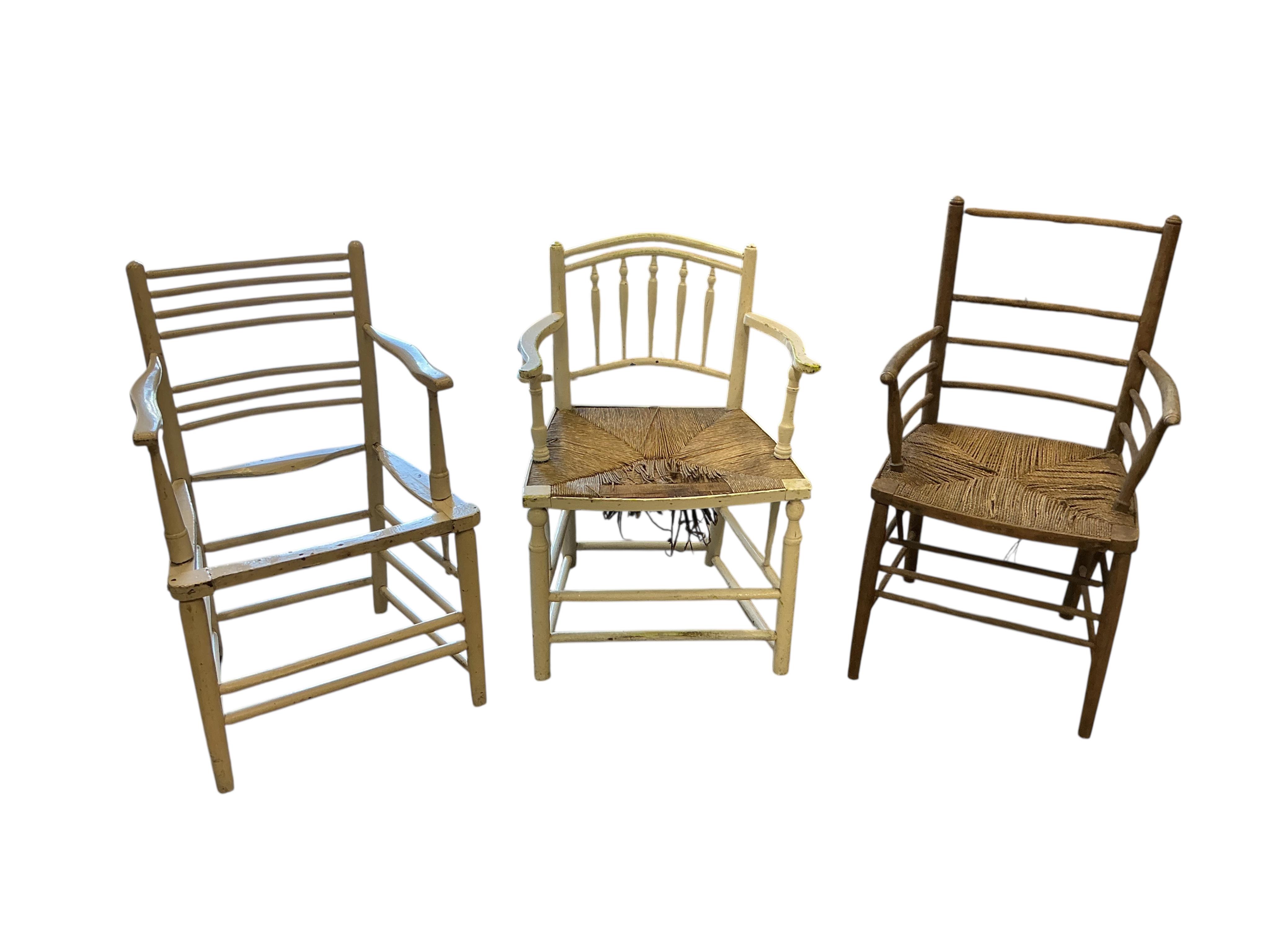 Six 19th century and later Sussex elbow chairs, in need of restoration
